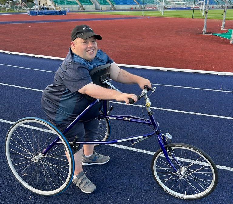 young man on frame runner